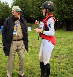 Selena goes over her ride on 'Woody' with owner John Rumble, who is himself an Olympic bronze medalist in Three Day Eventing. 