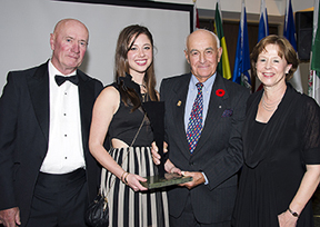 Doug Henry was inducted into the Jump Canada Hall of Fame in the category of Builder (Individual) in a special ceremony, presented by BMO Financial Group, on November 2 at The Royal Agricultural Winter Fair in Toronto, ON. Jim Henry, Kaitlin Henry Armstrong, and Nancy Armstrong accepted the award from Jim Elder (second from right) on behalf of Doug Henry. Photo by Michelle C. Dunn