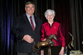 The lMichael Gallagher, President Equine Canada and Faith Berghuis, accepting for Ian Millar on behalf of Big Ben. Photo by Shereen Jerrett egendary Big Ben was posthumously awarded with The Hickstead Trophy