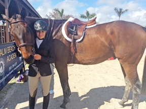 Zion, Champion of the Thoroughbred hunter division, with owner Noelle Rauscher