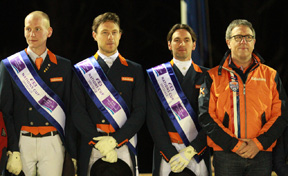 The Netherlands team of Diederik van Silfhout, Laurens van Lieren and Tommie Visser with Chef d’Equipe Wim Ernes on the top step of the podium following their victory at the second leg of the FEI Nations Cup™ Dressage 2014 pilot series at Vidauban, France tonight. Photo: FEI/Rui Pedro Godinho.