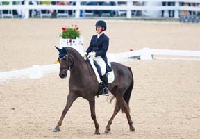 Alison Springer (USA) and Arthur were outstanding in the Dressage, scoring the only sub-40 mark to take the overnight lead at the Rolex Kentucky Three Day Event (USA), third leg of the FEI Classics™. Photo: Anthony Trollope/FEI.