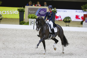 Great Britain’s Charlotte Dujardin and the brilliant gelding Valegro set yet another new world record when scoring 87.129 to win today’s Grand Prix at the Reem Acra FEI World Cup™ Dressage 2013/2014 Final in Lyon, France. Photo by FEI/Dirk Caremans.