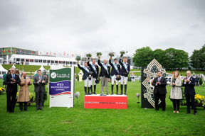 The British team won today’s fourth leg of the Furusiyya FEI Nations Cup™ Jumping Europe Division 1 League at St Gallen, Switzerland. Pictured on the podium are (L to R) Robert Whitaker, Guy Williams, Rob Hoekstra (Chef d’Equipe), Daniel Neilson and Spencer Roe. In front (L to R) John Roche, FEI Director Jumping; H.E. Hazem Mohammed Karakotly, Saudi Arabian Ambassador to Switzerland; Juan-Carlos Capelli, Vice President and Head of International Marketing Longines; Saad S. Alreshidi, KSA; Nayla Stössel, President CSIO St Gallen; Councillor Martin Gehrer, St Gallen. Photo: FEI/Carlo Stuppia.