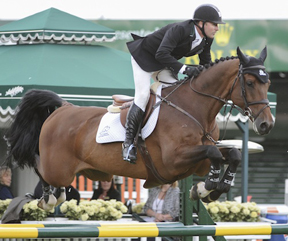 Eric Lamaze and Powerplay won the $85,000 ATB Financial Cup 1.55m at the Spruce Meadows National. Photo by Spruce Meadows Media Services