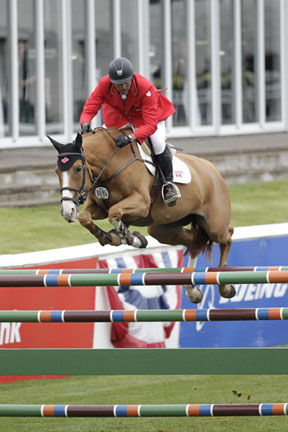 Yann Candele and Showgirl jumped clear for Canada in the second round of the $125,000 Furusiyya FEI Nations' Cup held Friday night, June 13, at the Spruce Meadows 'Continental' tournament in Calgary, AB. Photo by Cansport