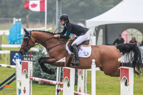 Amy Millar guides her new mount, Heros, to victory in the $50,000 Zucarlos Grand Prix, presented by Kubota Canada and Stewart’s Equipment, on August 16 at the CSI2* Orangeville Show Jumping Tournament in Orangeville, ON. Photo by Ben Radvanyi Photography