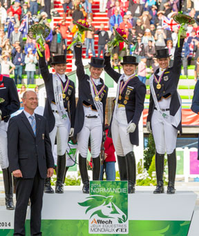 Team Germany clinched the Dressage team title at the Alltech FEI World Equestrian Games™ in Normandy, France today. L to R: Chef d’Equipe Klaus Roeser, Kristina Sprehe, Helen Langehanenberg, Isabell Werth and Fabienne Lutkemeier. Photo by Dirk Caremans/FEI