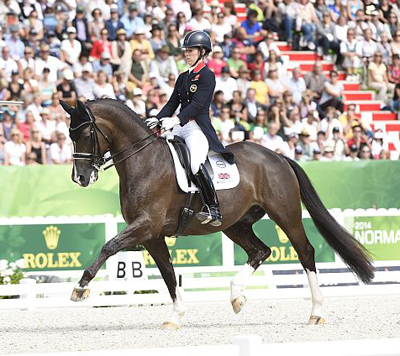 Thumbnail for Charlotte Dujardin Takes Gold in Grand Prix Freestyle