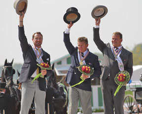 The individual Driving medallists in the Alltech FEI World Equestrian Games™ 2014 in Normandy. Pictured from left to right are silver medallist Chester Weber (USA); gold medallist and world champion Boyd Exell (AUS); bronze medallist Theo Timmerman (NED). Photo by Marie de Ronde-Oudemans/FEI