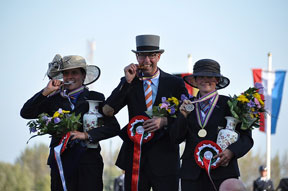 Wilbrord van den Broek (centre) won individual gold at the FEI World Single Driving Championships 2014 in Izsák (HUN) with Germany’s Claudia Lauterbach taking silver (left) and compatriot Marlen Fallak claiming bronze. Photo by Claudia Spitz/FEI
