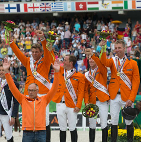 Caption: The Dutch claimed gold in the Jumping team championship at the Alltech FEI World Equestrian Games™ 2014 in Normandy today. L - R Jeroen Dubbeldam, Gerco Schroder, Maikel van der Vleuten and Jur Vrieling with Chef d'Equipe Rob Ehrens. Photo by Dirk Caremans/FEI