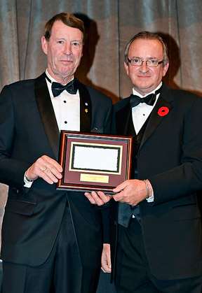 John Taylor presents Ian Millar, representing CP, with the 2014 Jump Canada Sponsor of the Year Award. Photo by Michelle Dunn