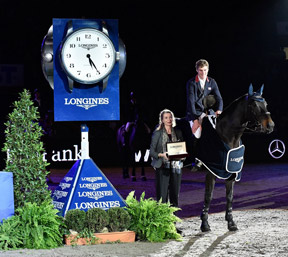 Great Britain’s William Whitaker pictured with Longines representative Christiane Becherer after his victory with Fandango in today’s Longines FEI World Cup™ Jumping 2014/2015 Western European League qualifier at Stuttgart, Germany. Photo by FEI/Karl-Heinz Freiler