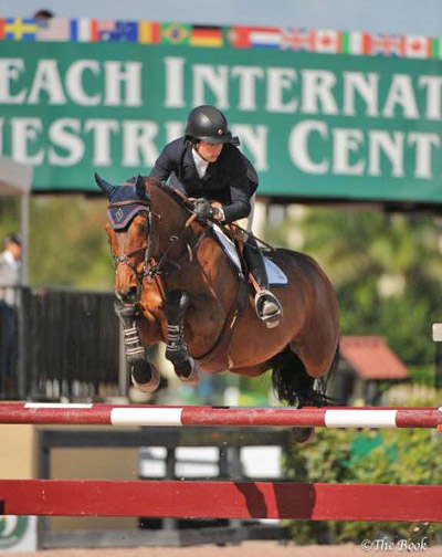 Julie Welles and Twan at WEF this year. Photo by The Book