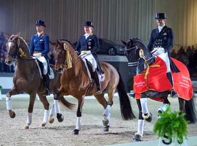 The top three in today’s last leg of the Reem Acra FEI World Cup™ Dressage 2014/2015 Western European League at ‘s-Hertogenbosch (NED): Left to right - third-placed Hans Peter Minderhoud/Glock’s Flirt from The Netherlands, runners-up Isabell Werth/Don Johnson FRH from Germany and winners Edward Gal/Glock’s Undercover from The Netherlands. Photo by FEI/Arnd Bronkhorst