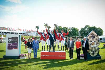 At the prize-giving for today’s Furusiyya FEI Nations Cup™ Jumping 2015 Europe Division 1 qualifier at St Gallen, Switzerland where Team Belgium were victorious: (L to R) Sabrina Zeender, FEI Secretary General; Farouk Mohamad Wazeer Ali, Saudi Arabian Chargé d’affaires to Switzerland; winning Belgian team Niels Bruynseels, Pieter Devos, Dirk Demeersmann (Chef d’Equipe), Greogry Wathelet, Jos Verlooy; Markus Straub, Präsident des Kantonsrates des Kantons St. Gallen; Nayla Stössel, President of Organising Committee CSIO St. Gallen and Urs Schiendorfer, Event Director CSIO St. Gallen. Photo by FEI/Katja Stuppia
