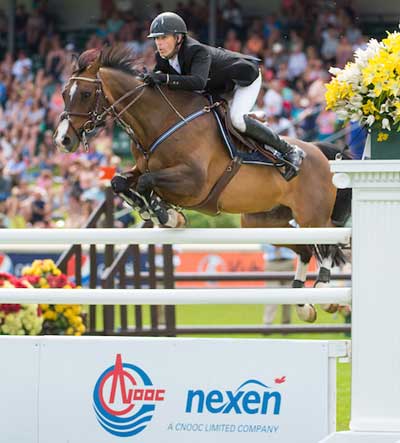 Richard Spooner and Cristallo won the $210,000 CNOOC Nexen Cup in the Spruce Meadows National. Photo by Spruce Meadows Media Services