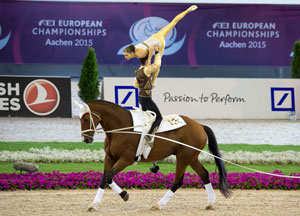 The reigning world and defending European champions, Jasmin Lindner and Lukas Wacha from Austria, clinched the Pas de Deux title once again the FEI European Vaulting Championships 2015 in Aachen, Germany. Photo by FEI/Dirk Caremans