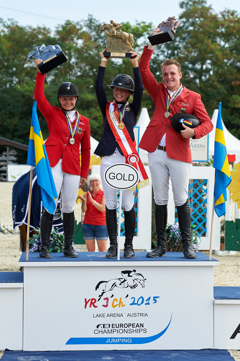 (L to R) Young Rider medallists Kaya Luthi from Germany (silver), Ebba Larsson from Sweden (gold) and Guido Klatte from Germany (bronze) at the FEI European Jumping Championships for Children, Juniors and Young Riders 2015 at Wiener Neustadt, Austria. Photo by FEI/Hervé Bonnaud