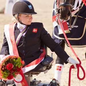 Denmark’s Stinna Tange Kaastrup, former World Grade Ib champion and 2011 European freestyle gold medallist, scored double bronze at the 2013 Europeans. She will be looking to get back on top at the three-day FEI European Para-Dressage Championships 2013 in Deauville, France, which start tomorrow. Photo by Liz Gregg/FEI