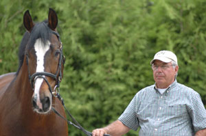 Rio Grande, pictured with owner Augustin Walch, will be inducted into the Jump Canada Hall of Fame on Sunday, November 8, 2015. Photo Courtesy of Michelle C. Dunn