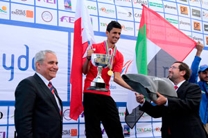 Individual gold medallist, Bahrain’s Fahad Helal Mohamed Al Khatri, is congratulated by FEI President Ingmar de Vos and Cristian Herrera, Director of the Chilean Endurance Federation at the FEI World Endurance Championships for Juniors and Young Riders 2015 at Santo Domingo, Chile. Photo by FEI/Rebecca Pearman