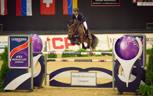 Kent Farrington (USA) and Voyeur claimed the victory at the Longines FEI World Cup™ Jumping qualifier in Kentucky (USA) after producing the fastest round in the jump-off. Photo by FEI/StockImageServices.com