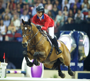 Beezie Madden, pictured here with Simon at the Longines FEI World Cup™ Jumping Final in Las Vegas last April, is the most decorated US female equestrian athlete of all time. She is currently the highest placed female athlete in the North American League, lying second in the East Coast standings. Photo by FEI/Arnd Bronkhorst