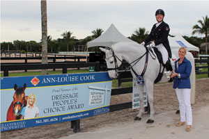 Ann-Louise Cook presents Jacqueline Brooks with the People’s Choice Award at the first competition of the 2016 Adequan Global Dressage Festival. Photo by Cora Causemann