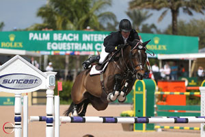 Shane Sweetnam and Buckle Up won the $35,000 Suncast® 1.50m Championship Jumper Classic. Photo by Sportfot