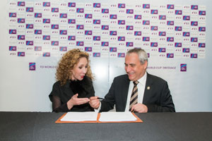 Reem Acra (left), the internationally renowned fashion designer, has extended her partnership with the FEI World Cup™ Dressage Western European league and series Final for a further three-year term through to 2019. She is pictured here with FEI President Ingmar De Vos at the official signing ceremony, which took place backstage at the Reem Acra Fall 2016 ready-to-wear runway show during last month’s New York Fashion Week. Photo by FEI/Peter Roessler