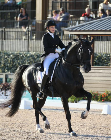 Ashley Holzer and Dressed in Black won the FEI Grand Prix Freestyle CDI 3* presented by Adequan® at TIEC. Photo by Sharon Packer Photography