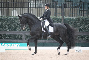 Ashley Holzer and Dressed In Black won the first ever FEI Grand Prix CDI 3* presented by Adequan® at the Tryon International Equestrian Center. Photo by Sharon Packer Photography