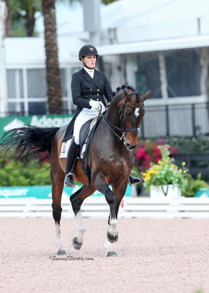 Ashley Holzer closed out the 2016 Adequan Global Dressage Festival in Wellington, FL on a high note, winning the FEI Grand Prix Freestyle on April 2 after earning an impressive score of 75.600% aboard her 2012 London Olympics partner, Breaking Dawn. Photo by Susan J. Stickle