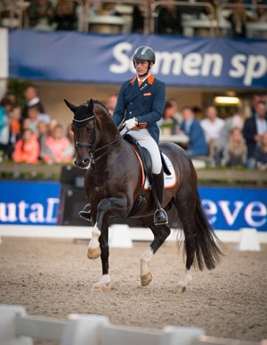 Diederik van Silfhout and Arlando NOP’s third-place finish in tonight’s Freestyle clinched victory for The Netherlands in the fourth leg of the FEI Nations Cup™ Dressage 2016 series. Photo by FEI/Arnd Bronkhorst