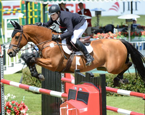 Peter Lutz (USA) and Robin de Ponthual won the $375,000 CP Grand Prix at the Spruce Meadows Continental. Photo by Spruce Meadows Media Services