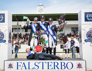 Team Sweden celebrating on the podium after clinching victory in the fifth leg of the FEI Nations Cup™ Dressage 2016 series on home ground in Falsterbo (SWE) today - Jennie Larsson, Patrik Kittel and Rose Mathisen, with Chef d'Equipe Bo Jenå in relaxed mood! (FEI/LOTTAPICTURES)