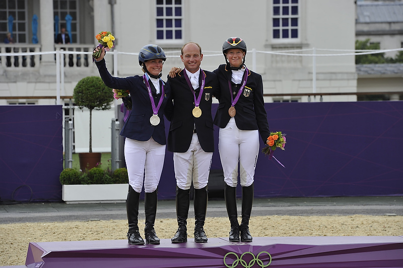 Gender equality: Germany’s Michael Jung took individual gold in Olympic Eventing at London 2012, with Sara Algottsson Ostholt (SWE) in silver and Sandra Auffarth (GER) in bronze. Photo by FEI/Dirk Caremans