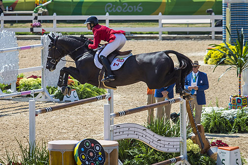 Tiffany Foster and Triple X III finish three rounds with eight faults and qualify for the individual final.