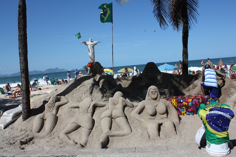 Sand sculptures overseen by Christ the Redeemer.
