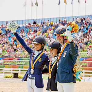 Rio 2016 Paralympics Grade IV podium – gold Sophie Wells (GBR), silver Michèle George (GER), bronze Frank Hosmar (NED). Photo by Liz Gregg/FEI