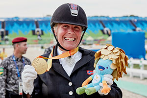 Norway’s Ann Cathrin Lübbe wins the first Para-Equestrian medal at Rio 2016, taking gold in the Grade III Individual test on Donatello. Photo by Liz Gregg/FEI
