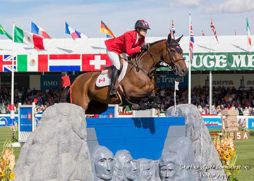 Tiffany Foster of North Vancouver, BC, posted the only double clear performance in the $300,000 BMO Nations’ Cup riding Victor, owned by Artisan Farms and Torrey Pines Stable. Photo by: Starting Gate Communications 