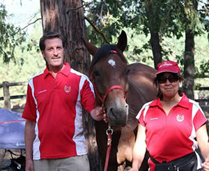 Dr. Yvette Vinton (right) will be representing Canada at the 2016 Longines FEI World Endurance Championships, taking place Sept. 16-18 in Samorin, SVK. Dr. Glenn Sinclair (left) will travel with Vinton, taking on the roles of team vet, groom and Chef d’Équipe. Photo courtesy of Equestrian Canada