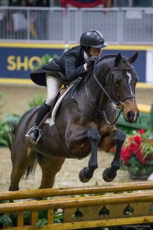 Darcy Hayes and Say When won the $15,000 Braeburn Farms Hunter Derby on Sunday, November 6, at the Royal Horse Show in Toronto, ON. Photo by Mackenzie Clark