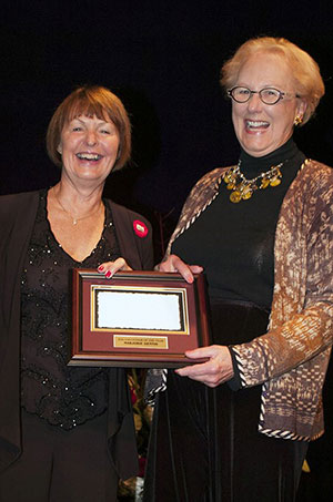 Marjorie Dennis of Caledon, ON was named the 2016 Greenhawk Jump Canada Volunteer of the Year in recognition of her longstanding dedication and invaluable contributions to hunter/jumper sport in Canada. She accepted the award from Pamela Law, Chair of Jump Canada, during the Jump Canada Hall of Fame Gala on Nov. 6 in Toronto, ON. Photo by Michelle Dunn