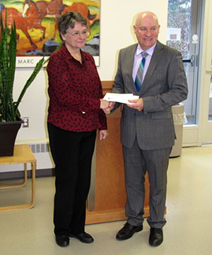 Equine Foundation of Canada treasurer, Susan Nelson, presented a cheque for $127,000 to Atlantic Veterinary College dean, Greg Keefe.