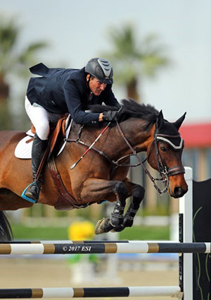 John Anderson and Terrific on their way to a $75,000 Back on Track Grand Prix win. Photo by ESI Photography