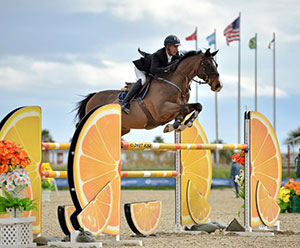 Richard Spooner and Cristallo on their way to a $25,000 SmartPak Grand Prix win. Photo by ESI Photography